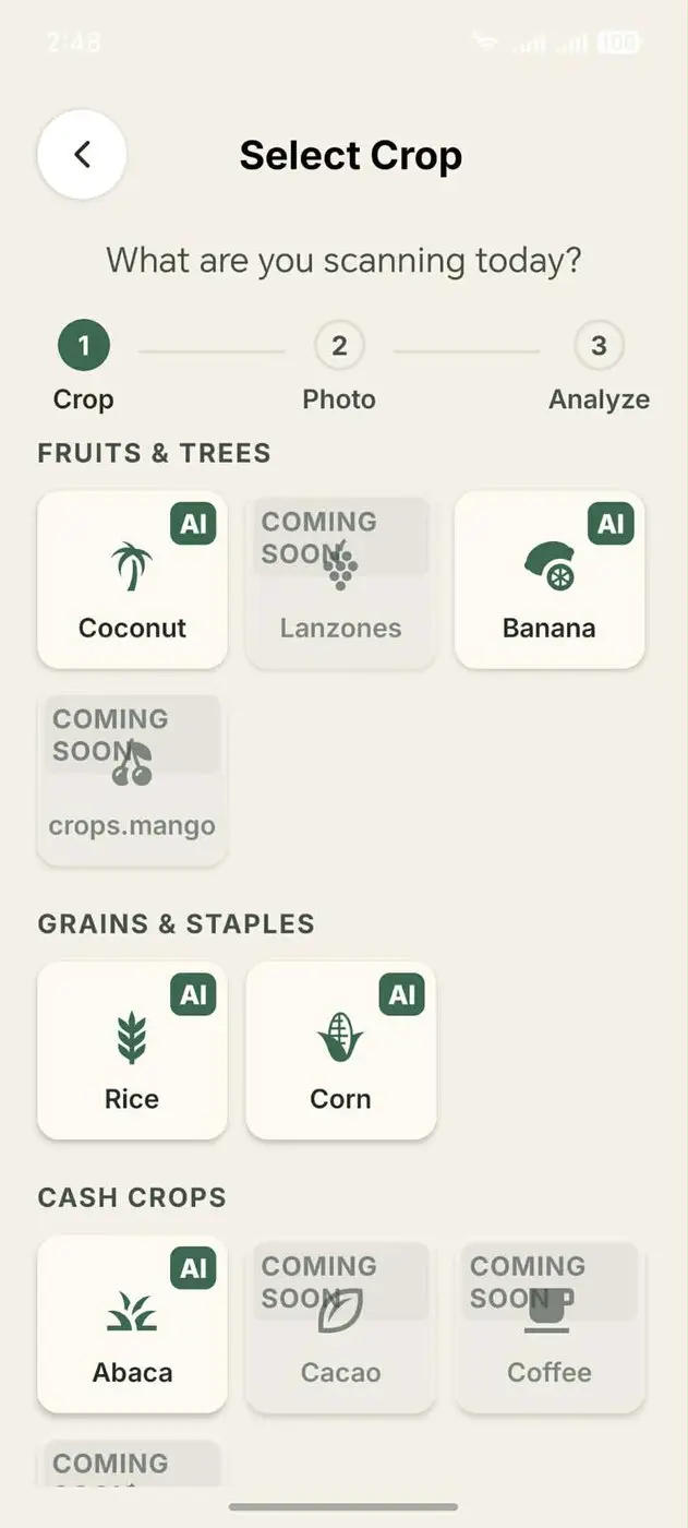 Crop selection screen showing coconut, banana, rice, corn and abaca available to scan, with other crops marked coming soon